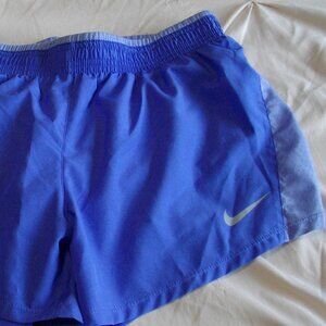 Women's Nike Dri-Fit running shorts. Medium, periwinkle blue.